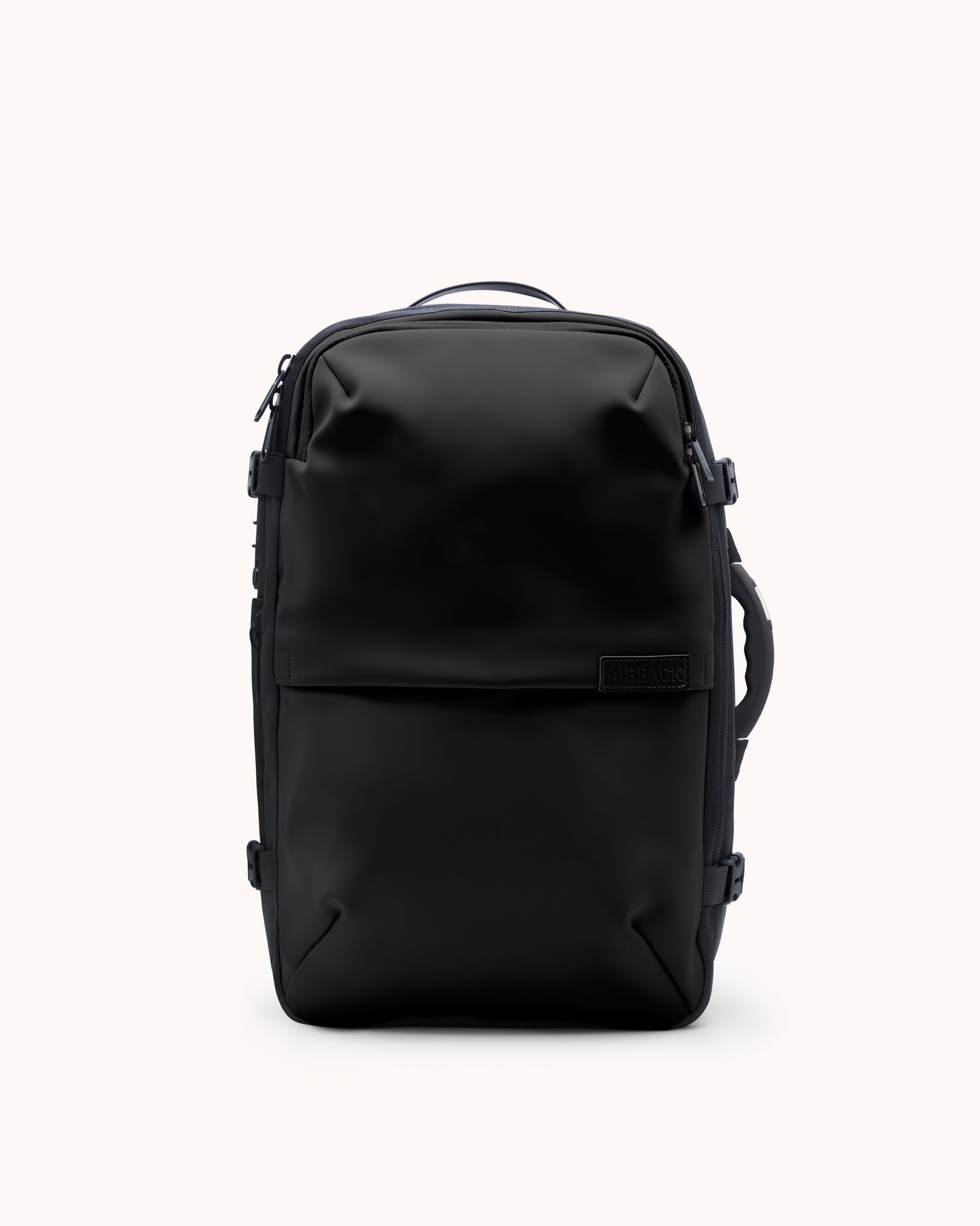 Black backpack on a white background
