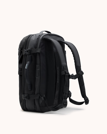 Black backpack on a white background